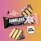 Junkless chewy drizzled granola bar packaging with birthday cake flavor on a gradient background