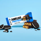 Cookies and cream protein bar with packaging on a blue background