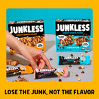 Junkless chewy granola bars packaging with a hand holding a bar on a gray surface.