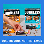Junkless chewy granola bars packaging with a hand holding one bar on a blue background.