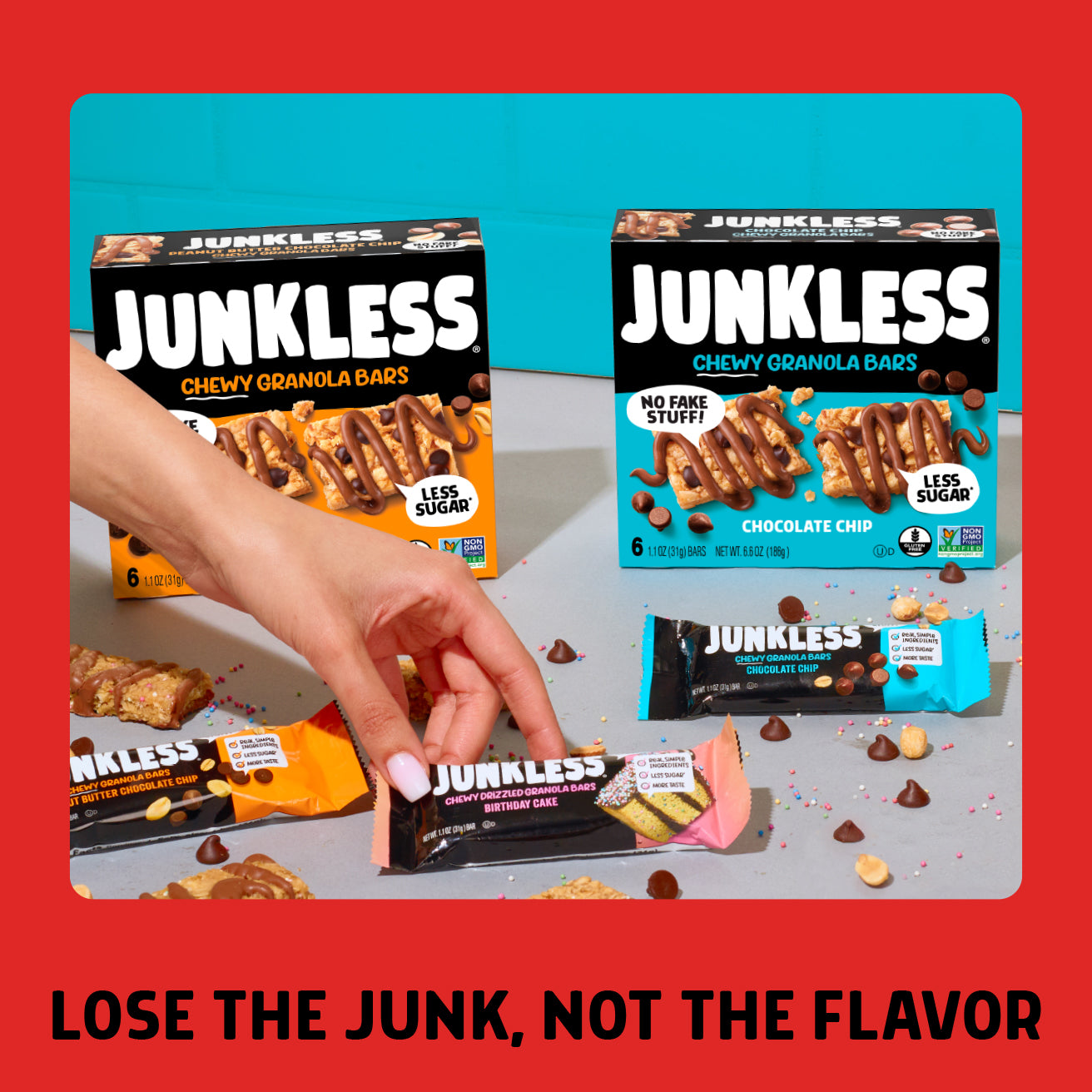 Junkless chewy granola bars packaging with a hand holding a bar against a red and blue background.