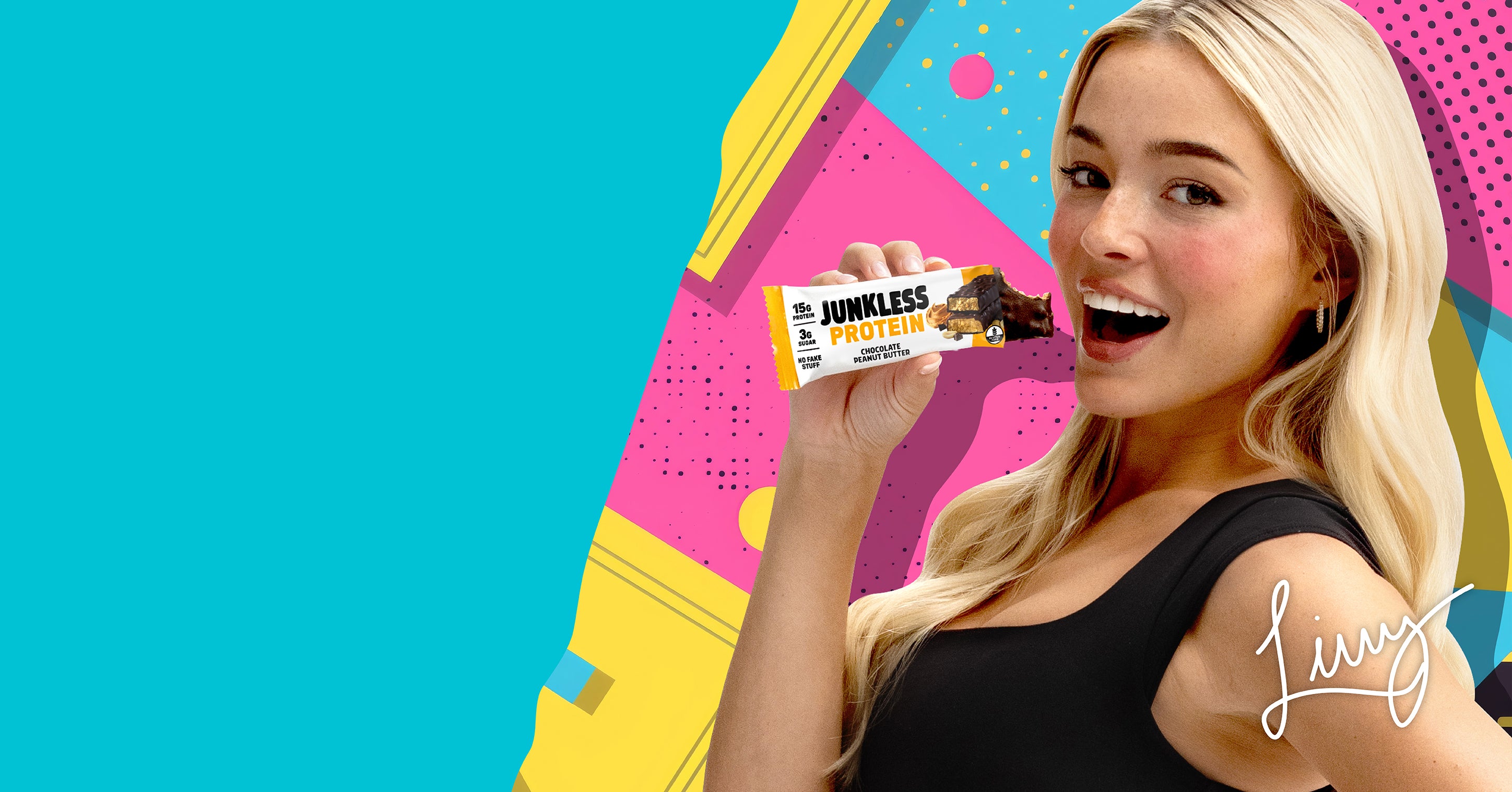 Livvy Dunne holding a Junkless Chocolate Peanut Butter Protein Bar.