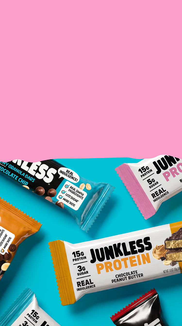 Junkless Protein Bars and Granola Bars on a Pink and Blue Background