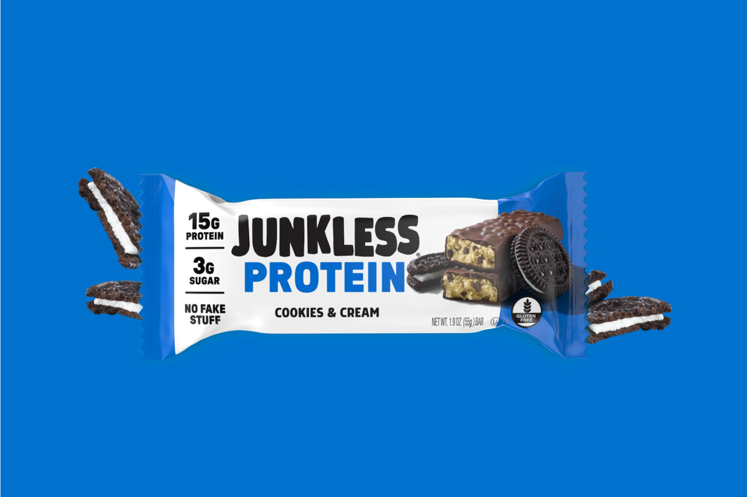 Junkless Protein Cookies & Cream flavor bar packaging on a blue background
