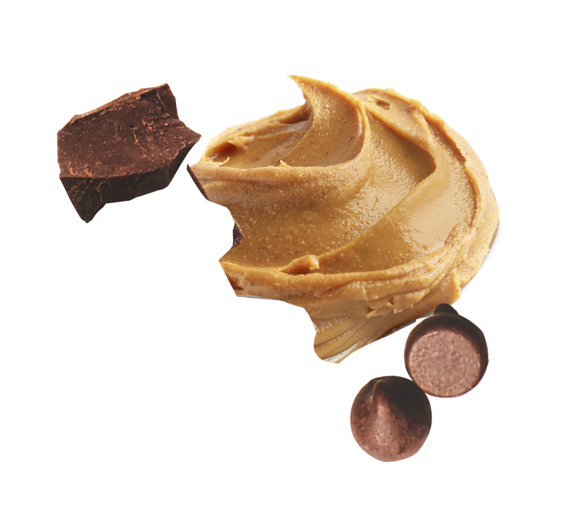 Swirl of peanut butter with chocolate pieces on a white background