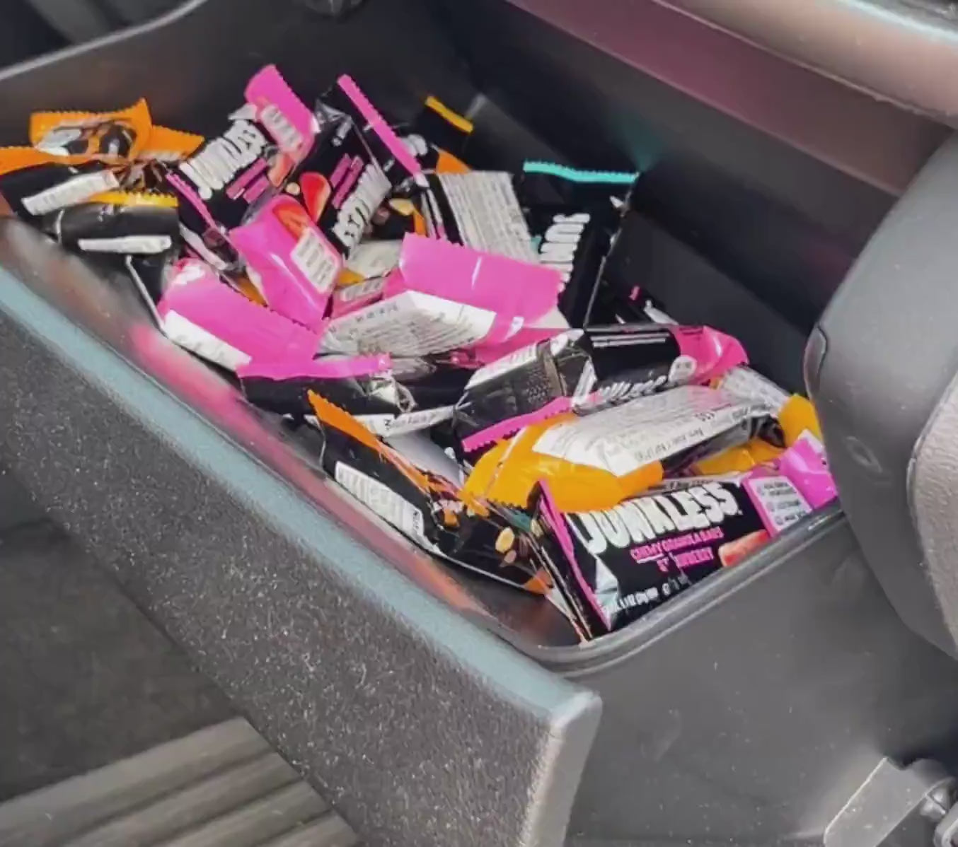 Junkless Chewy Granola Bars in a car glove box.