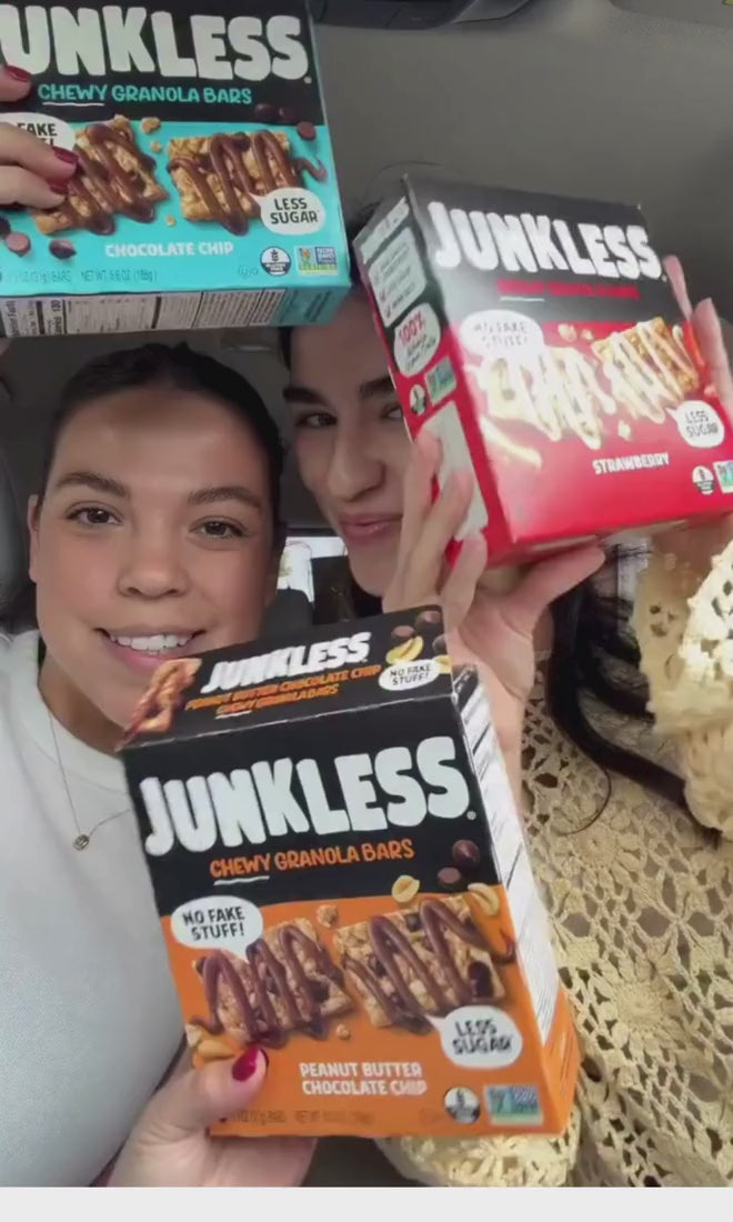 girls holding junkless boxes together in a car