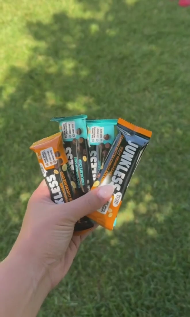Granola bars hovering over grass outside