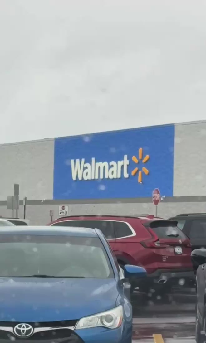 Walmart store from a window on a rainy day